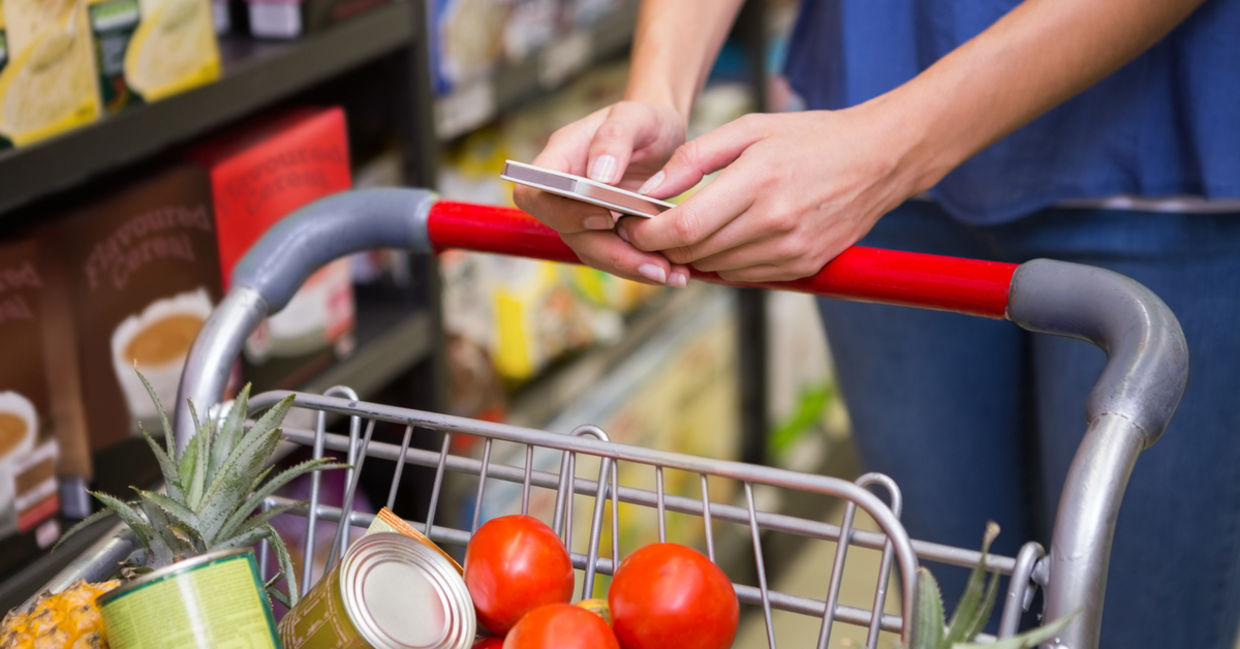 Woman shopping in supermarket.