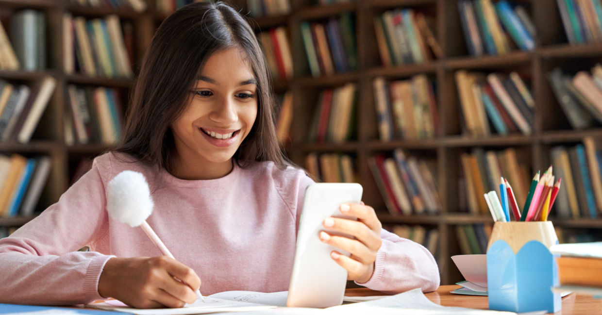 Girl using app for school work.