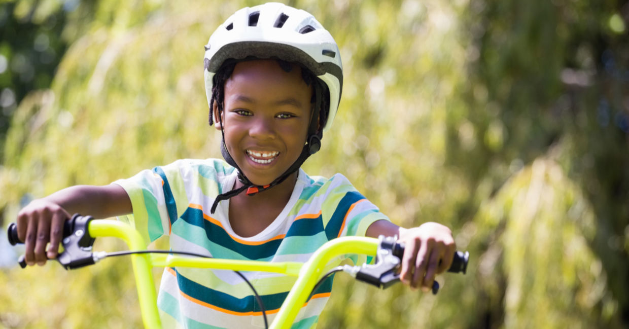 Kid riding a bike.