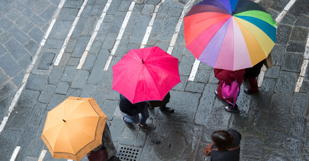 Pedestrians on a rainy day in the city.