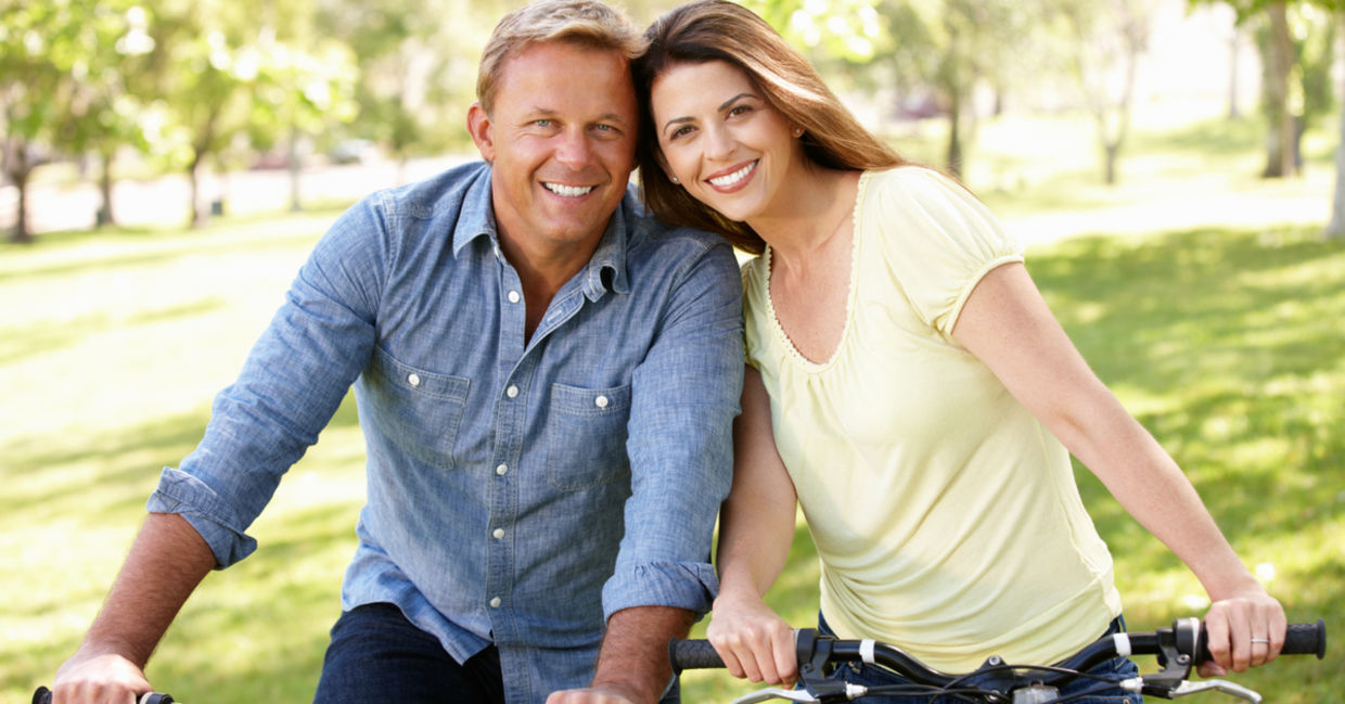 Loving couple riding bikes