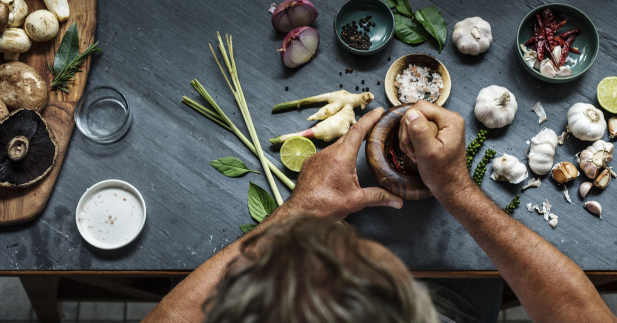 Cooking a traditional Asian spiritual meal with garlic.