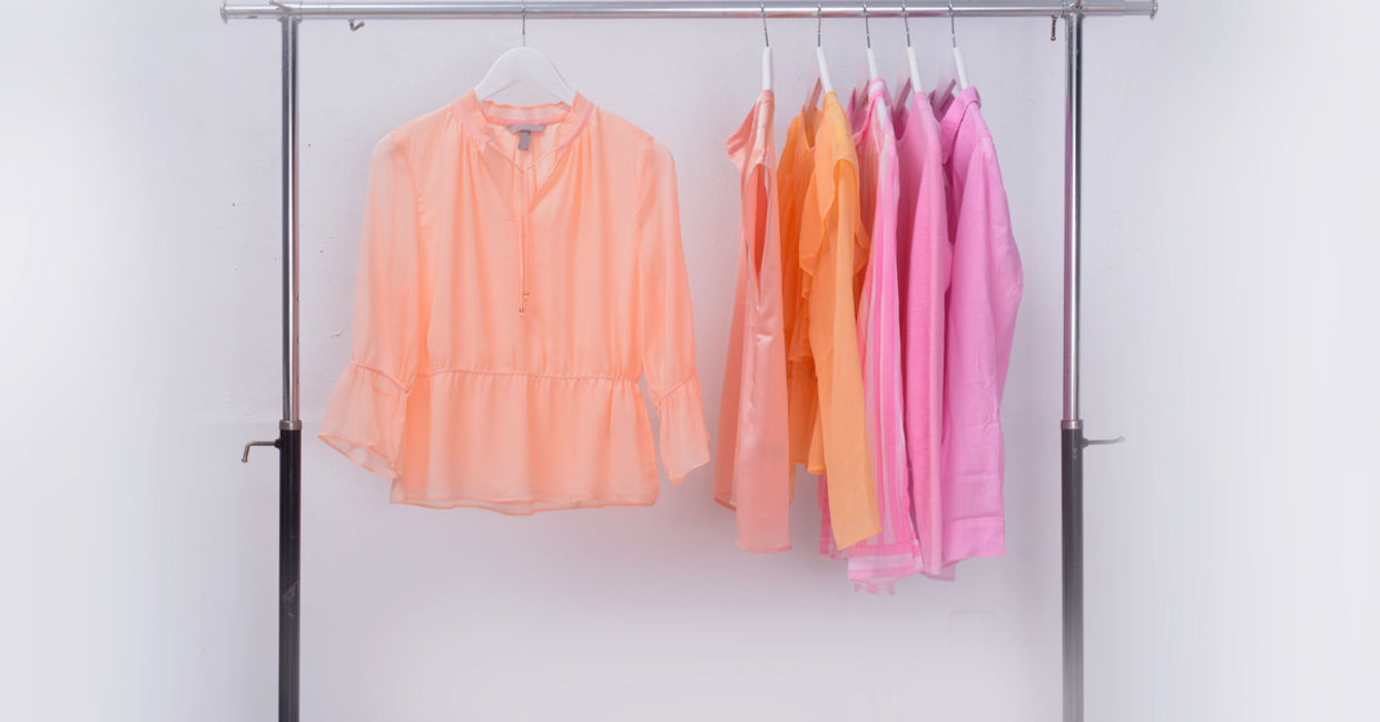 Various vintage clothes on a rail