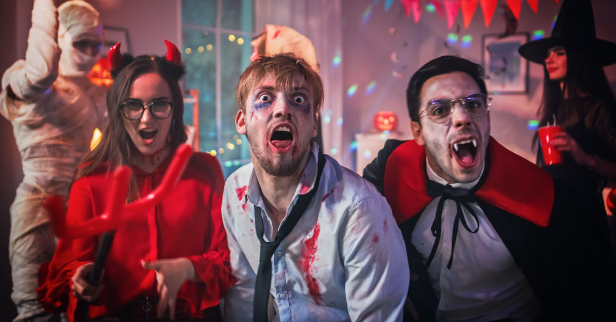 Monster costumes at a Halloween party.