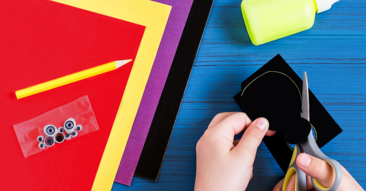 Using colorful paper to make a card.