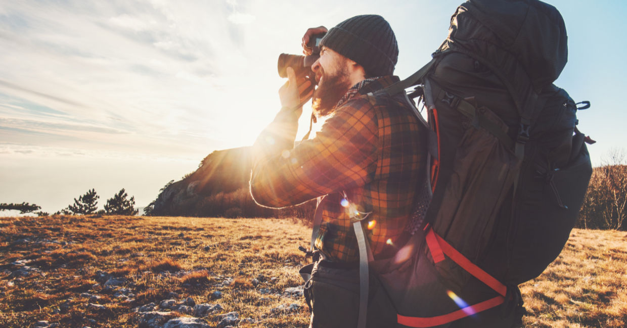 An inspired man pursues his passions by doing travel photography.