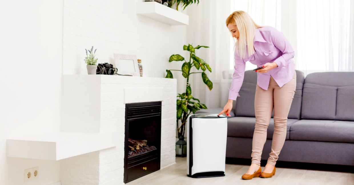 Woman cleaning filter