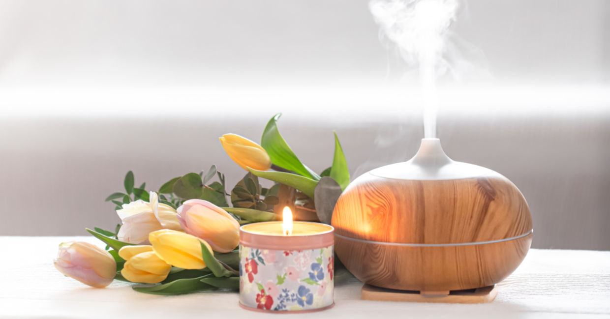 Freshly cut flowers and an aromatic oil diffuser uplift a room.