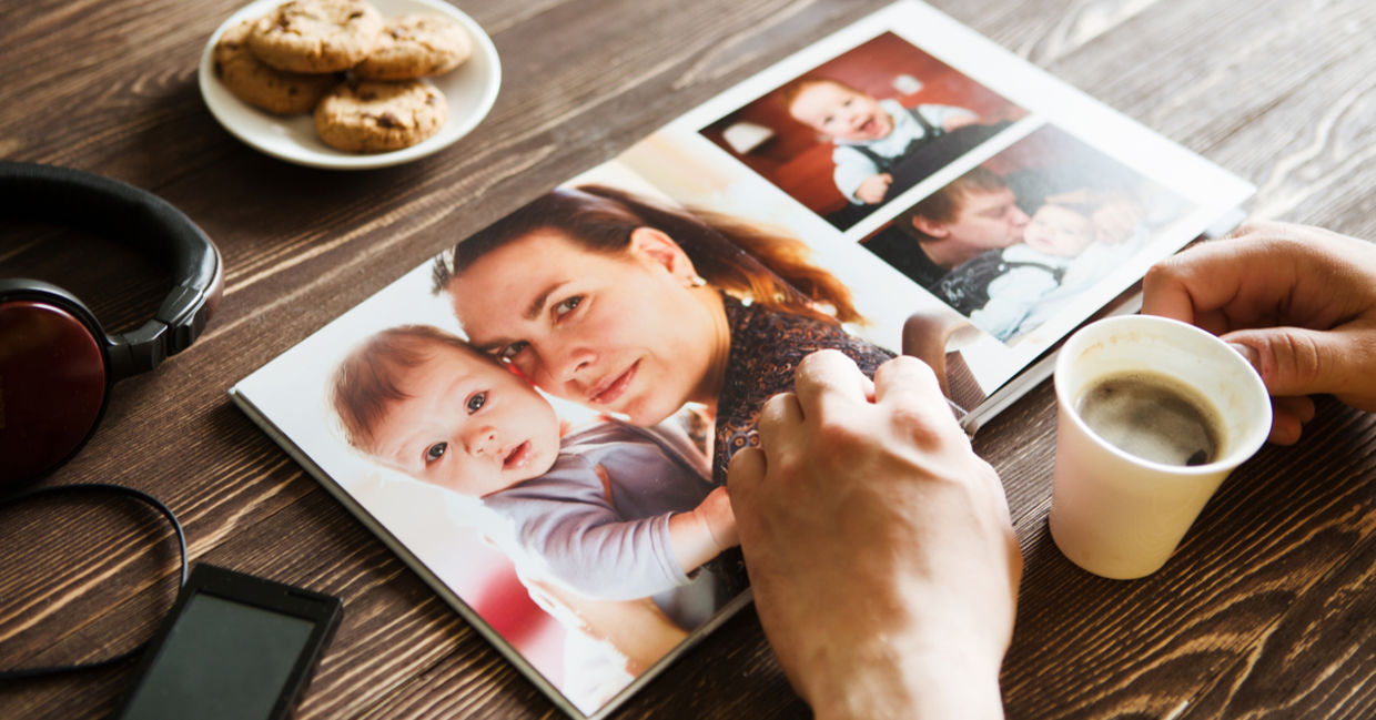 Nostalgically looking at photos.