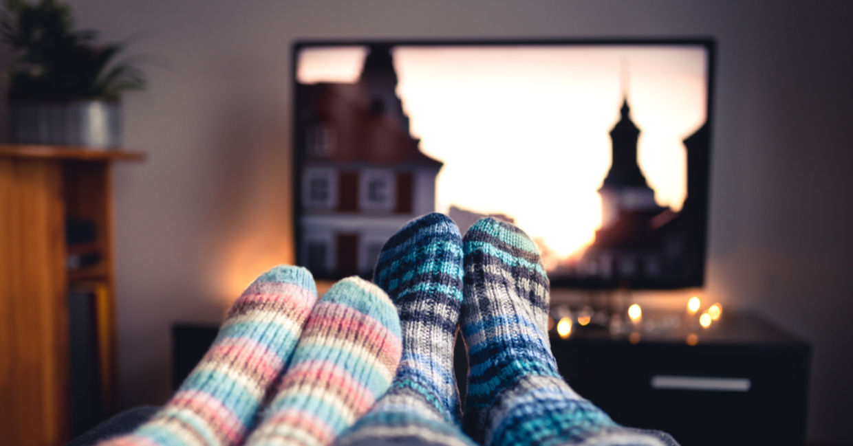 Watching a romantic movie together.