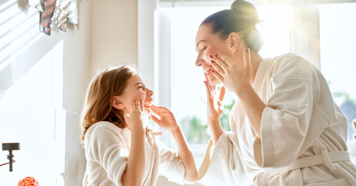 Mother and daughter with healthy skin.