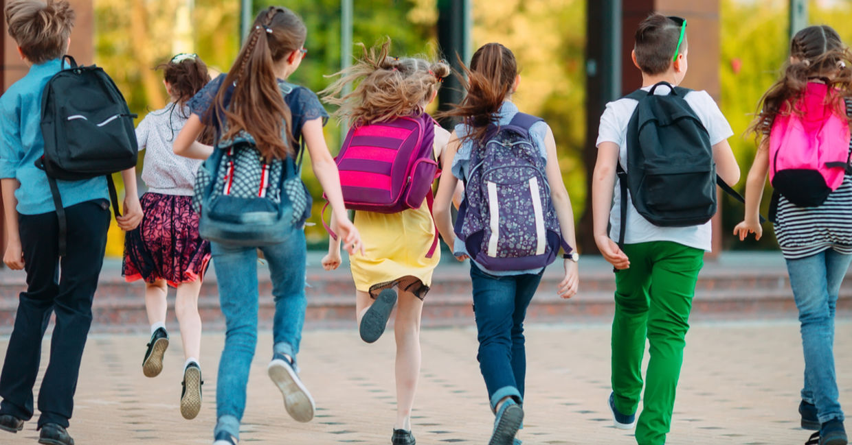Group of kids going to school together.