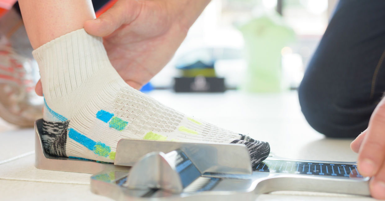 Getting sized for shoes.