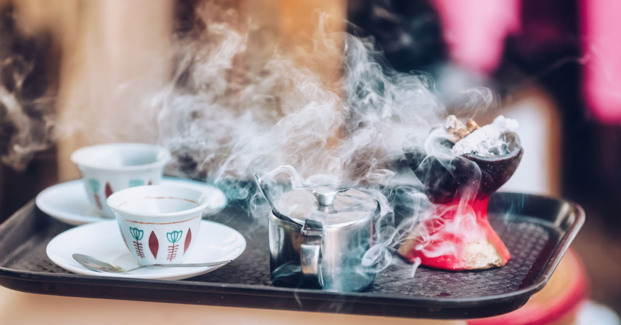 Traditional cup of Ethiopian coffee served with aromatic essence held to ward off bad spirits.