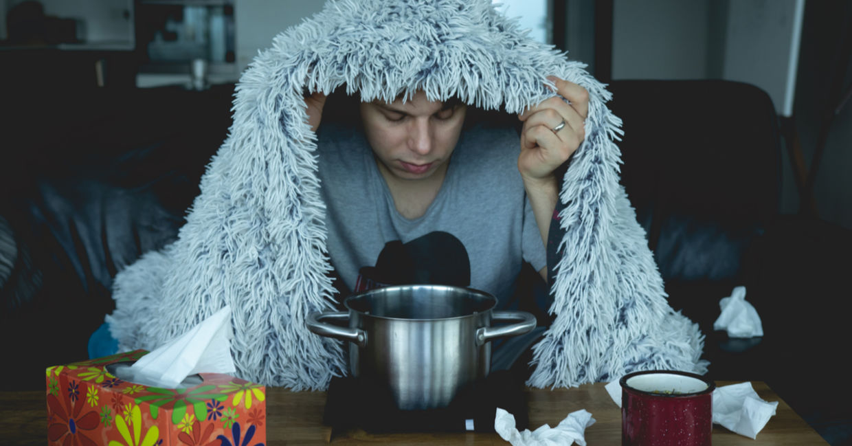 Inhaling steam to clear allergic congestion.