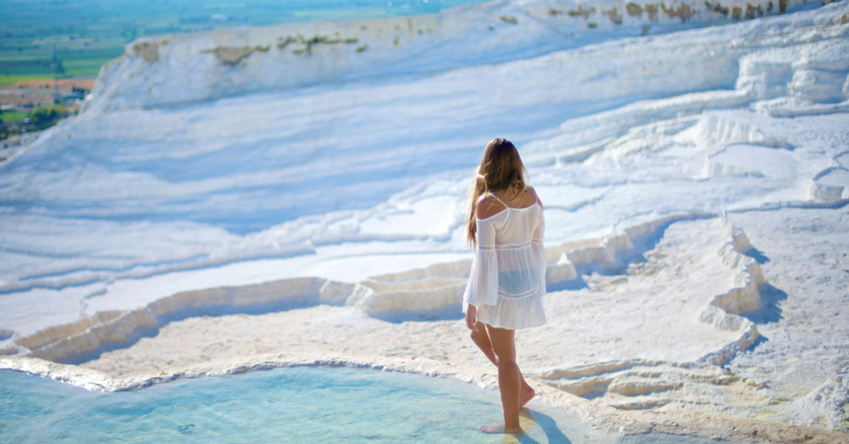 Woman enjoying the hot springs in Pamukkale.