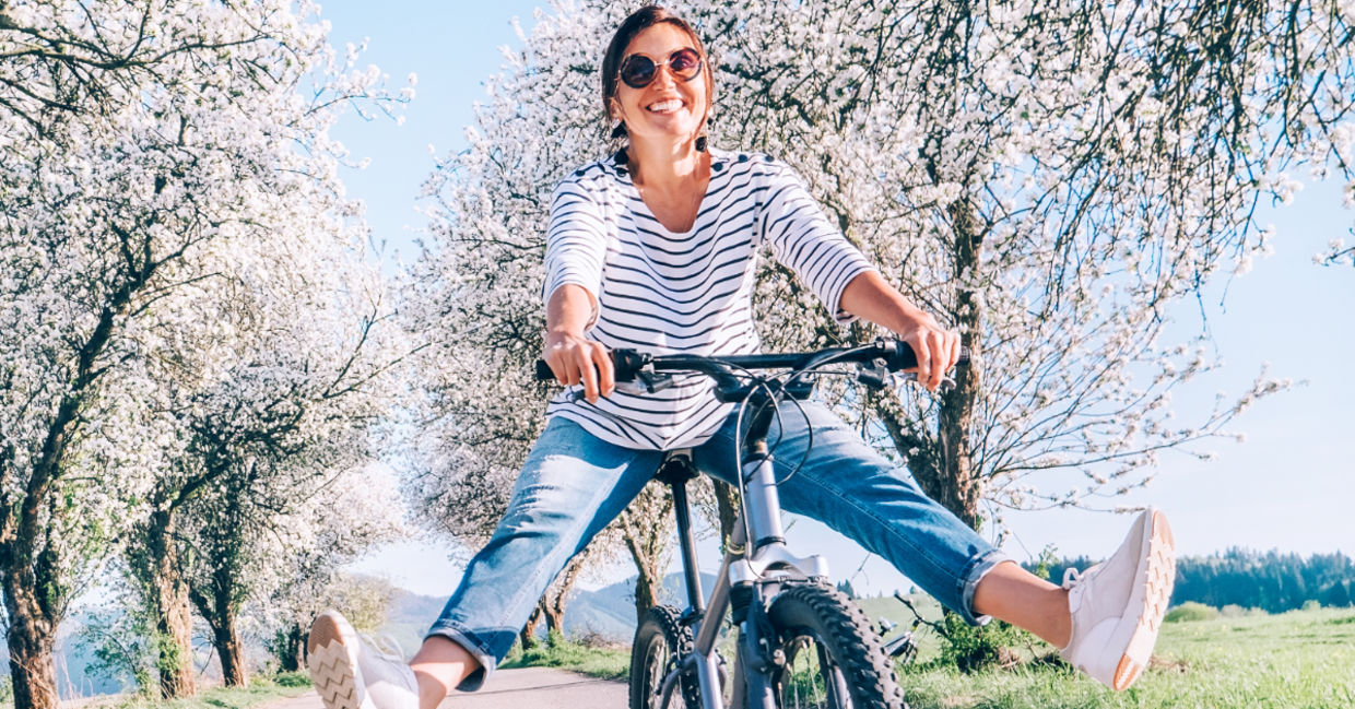 Happy and thriving  woman out in nature.