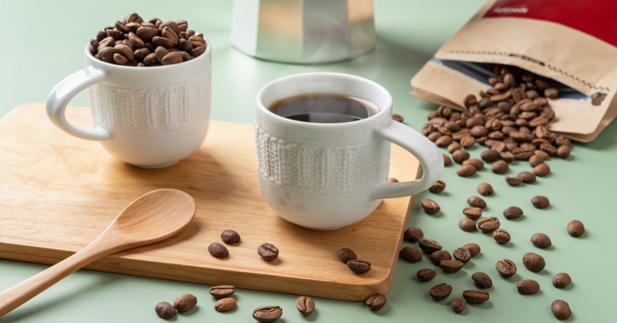 Espresso coffee and coffee beans.