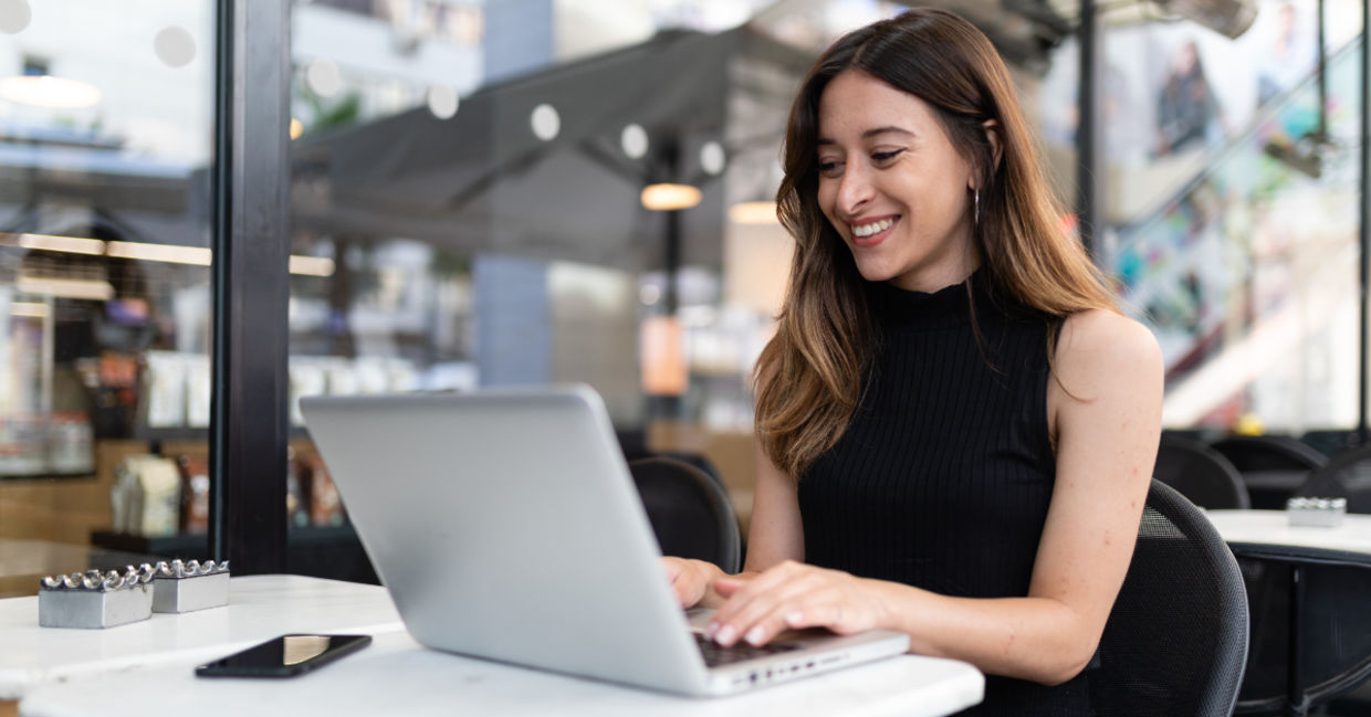A young woman typing.