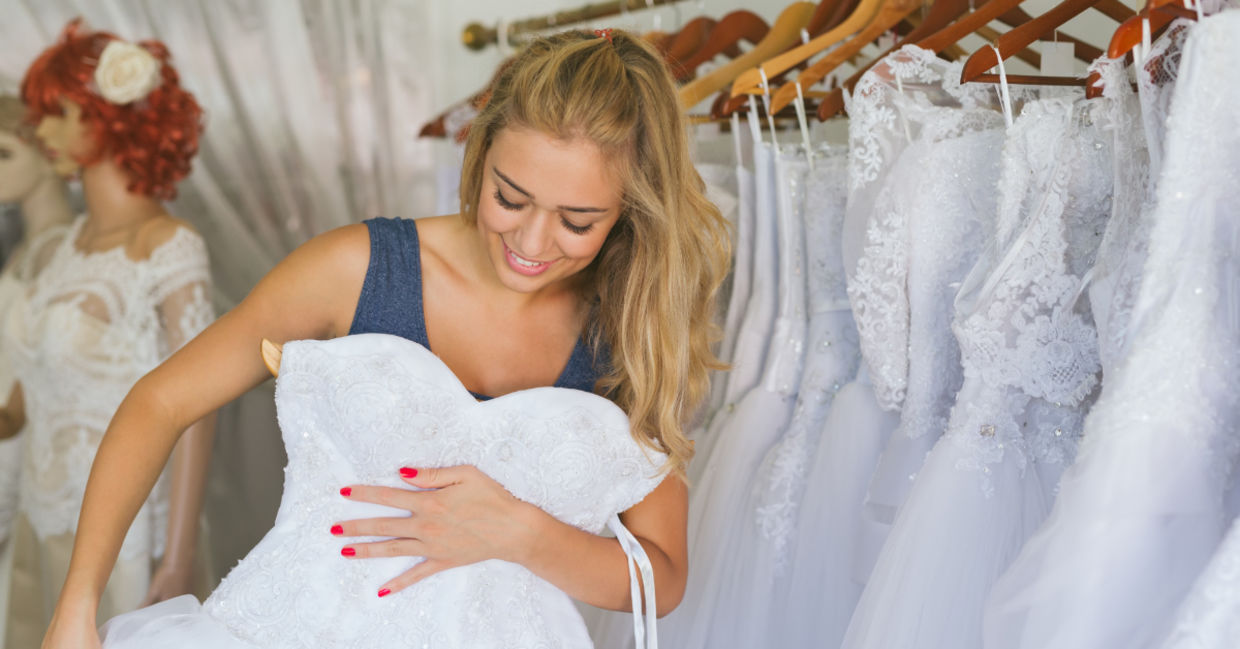 Woman choosing her wedding dress.