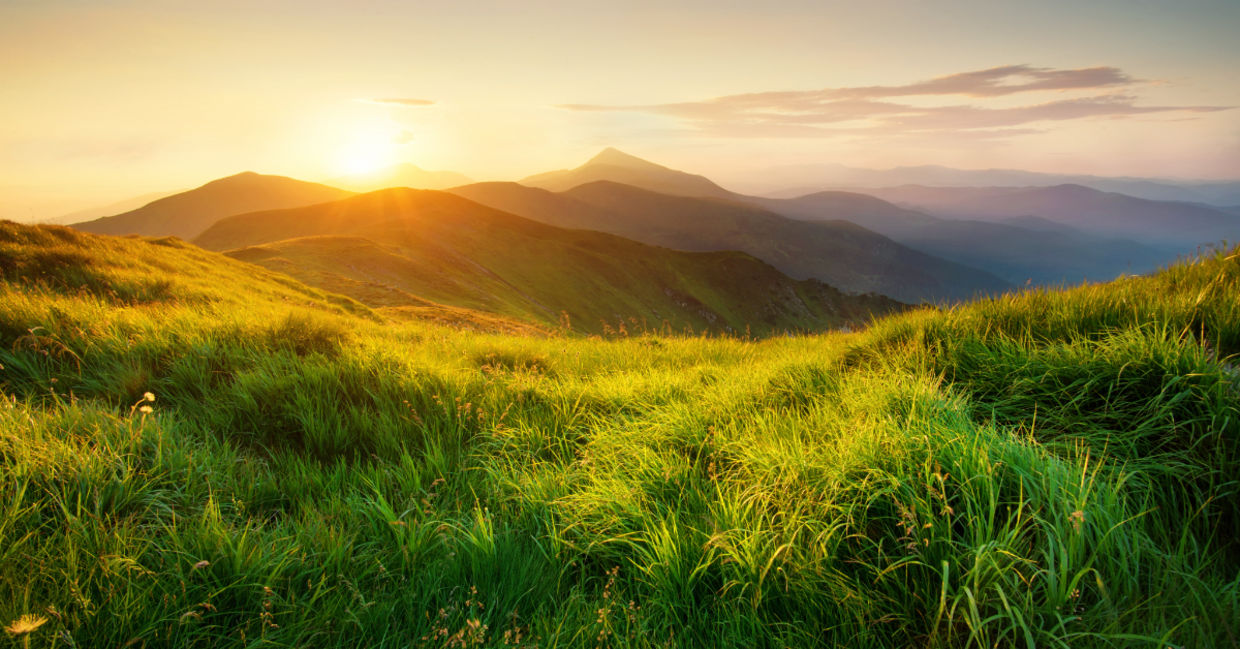 Mountains during sunset in a beautiful natural landscape in the summertime.