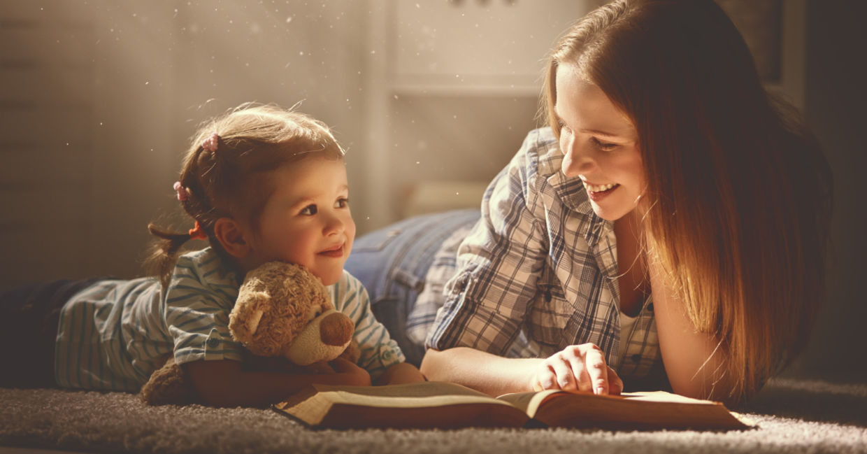 Reading to young a child.