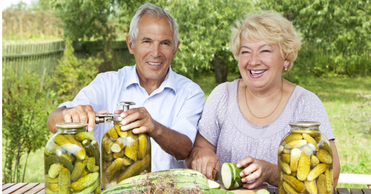 A couple makes DIY homemade pickles.