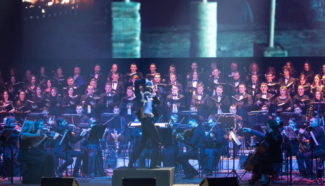 Choral group performs on stage