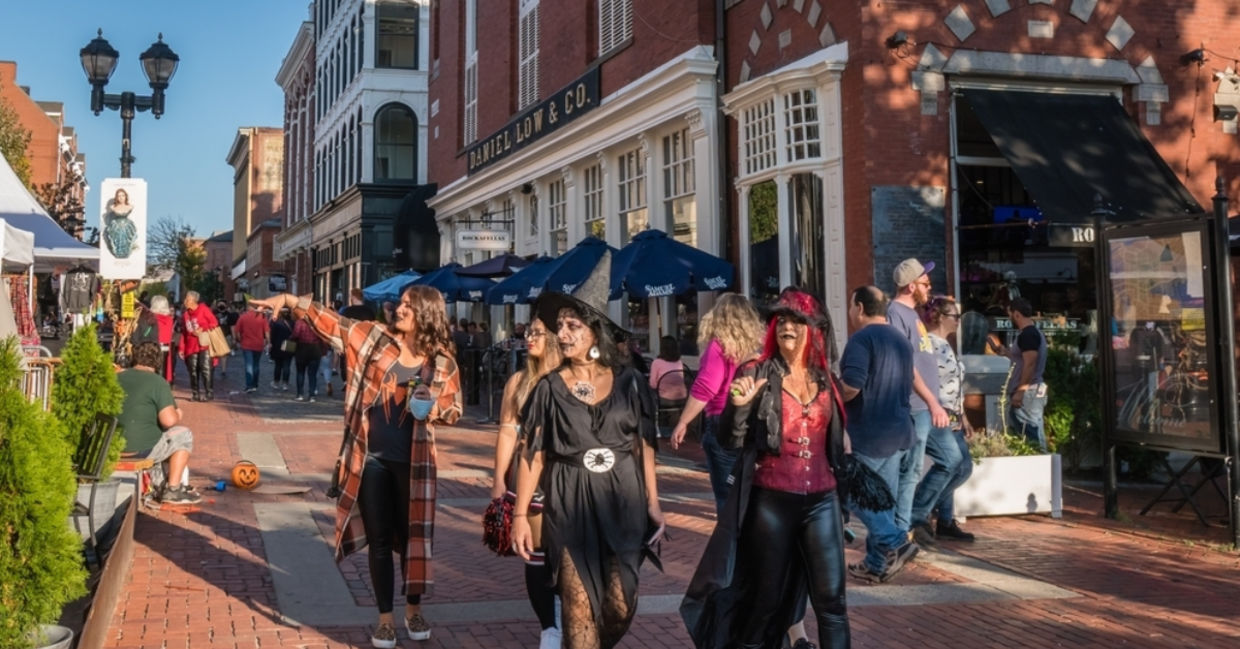 Tourists dressed up in costume visit Salem for Halloween.