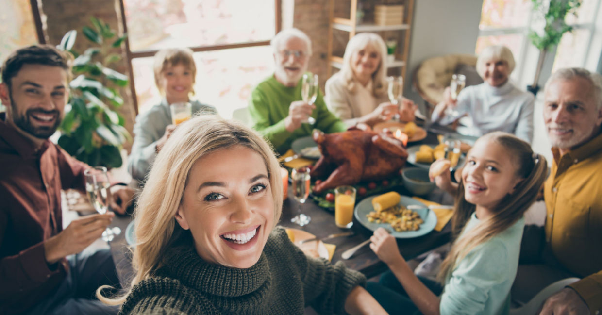 Family enjoying a traditional Thanksgiving feast.