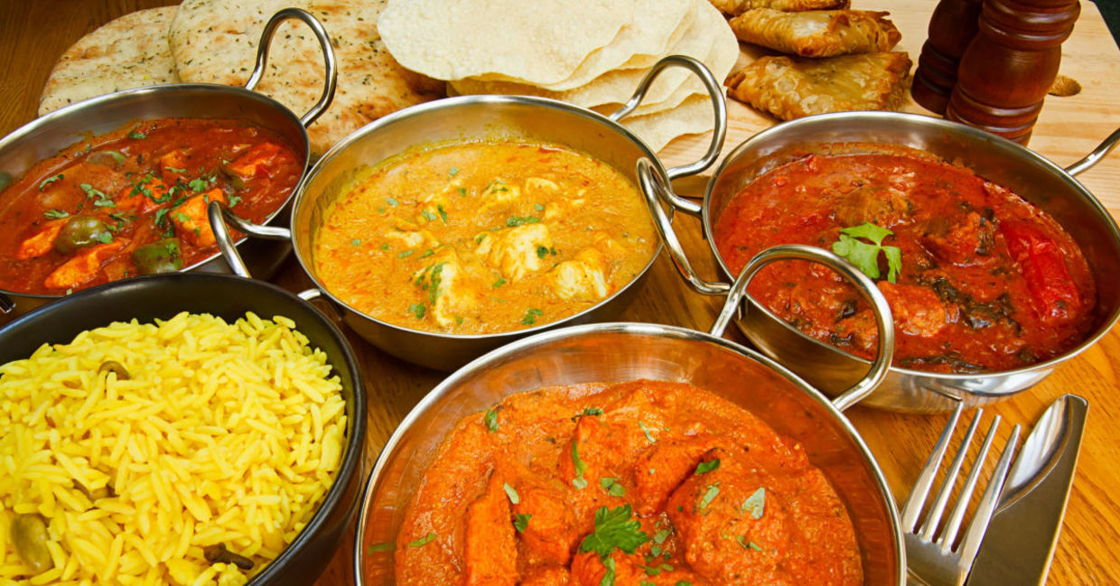 A colorful spread of Indian food for Thanksgiving.