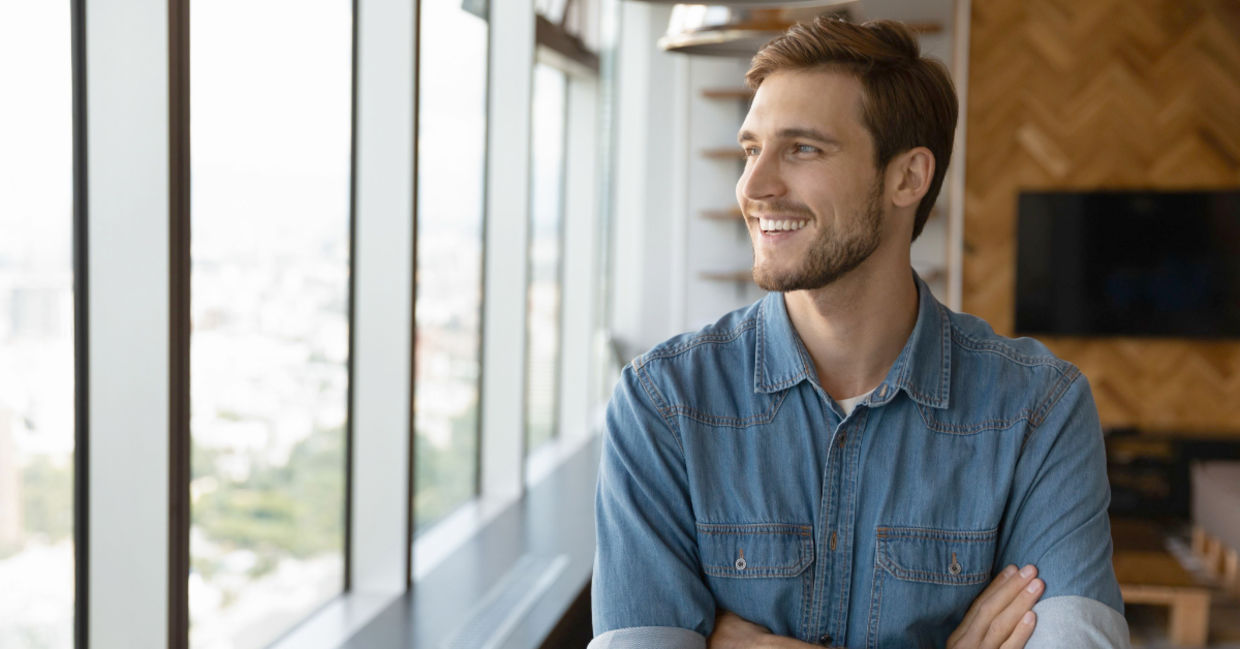 Businessman reflecting on his vision for the future  in his comfortable office.