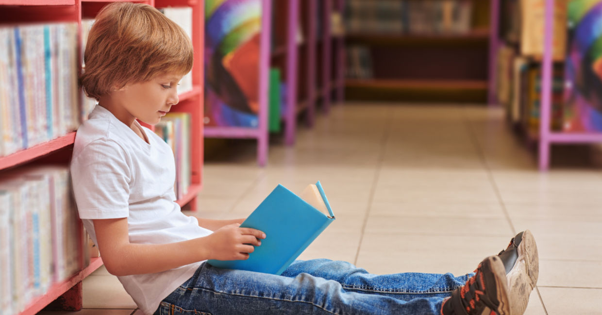Cute boy with a book.