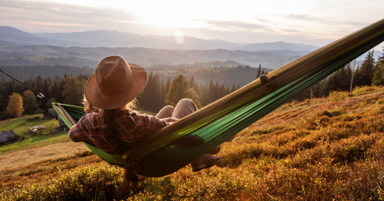 Resting on a hammock.