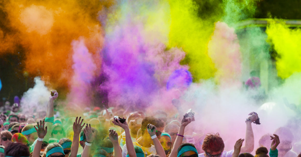 People are covered in colors.