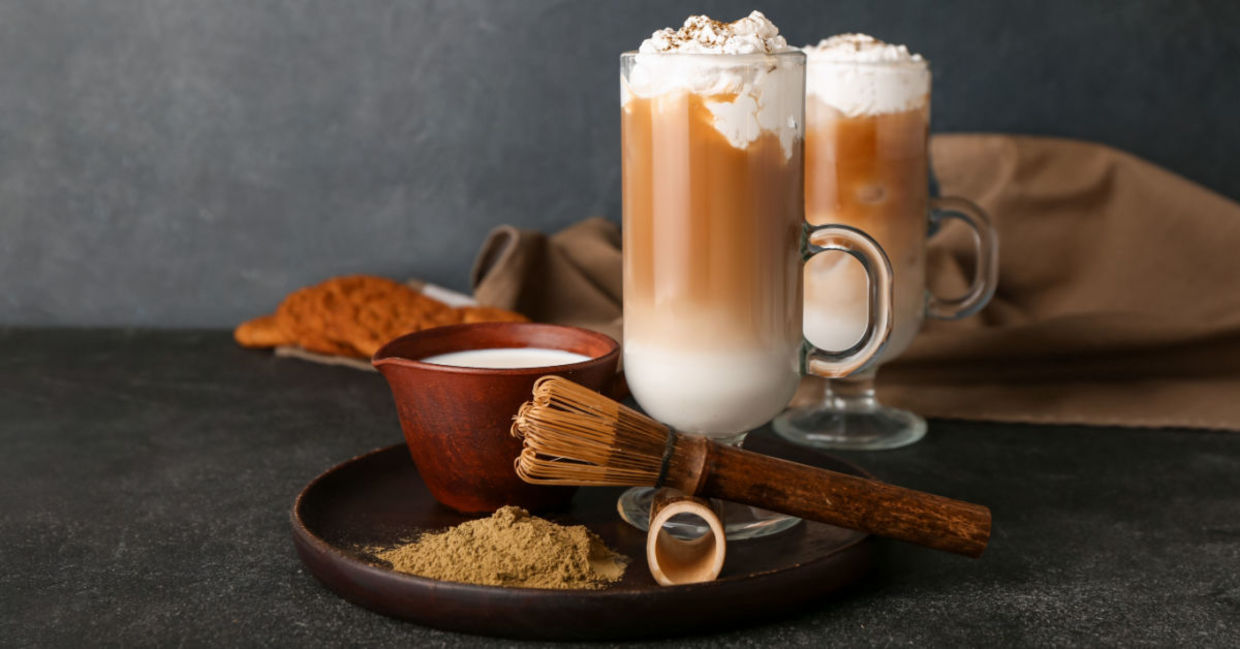 A glass of iced hojicha latte.