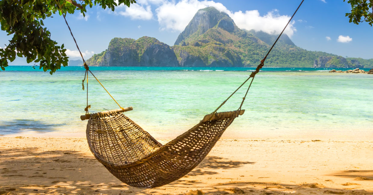 A hammock on a tropical island.