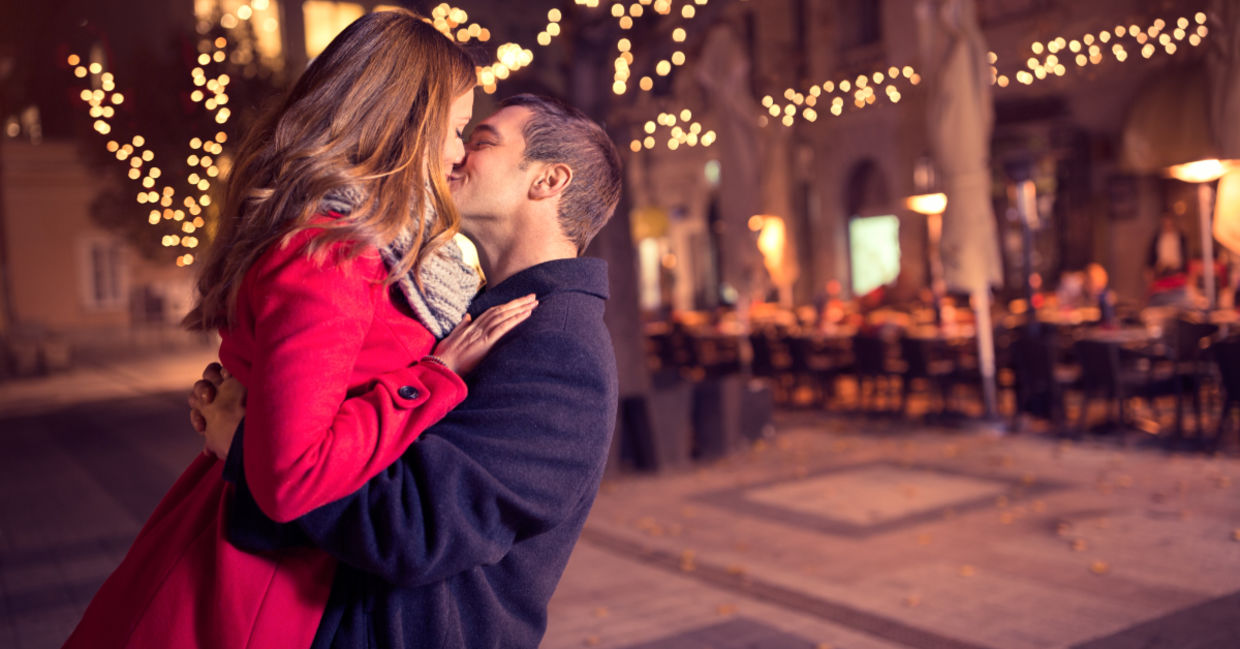 Young couple kissing.