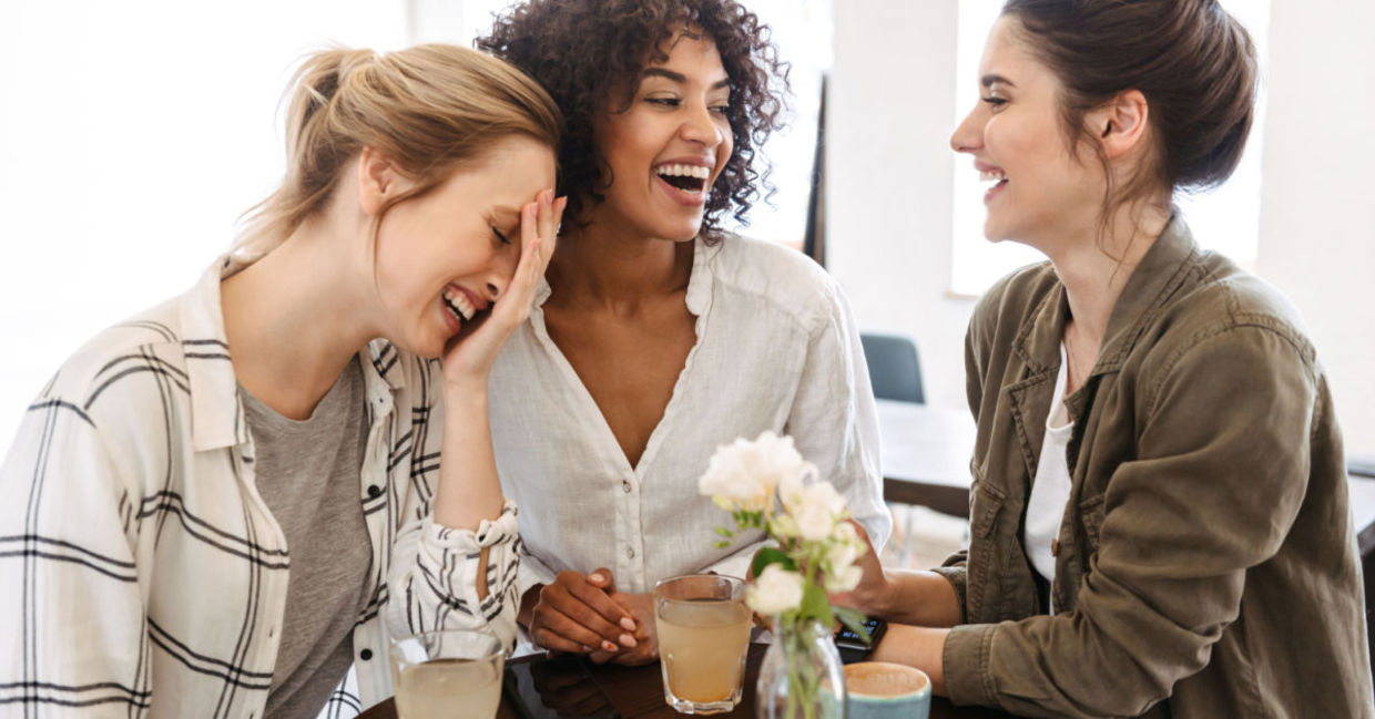 A group of friends talking and laughing.