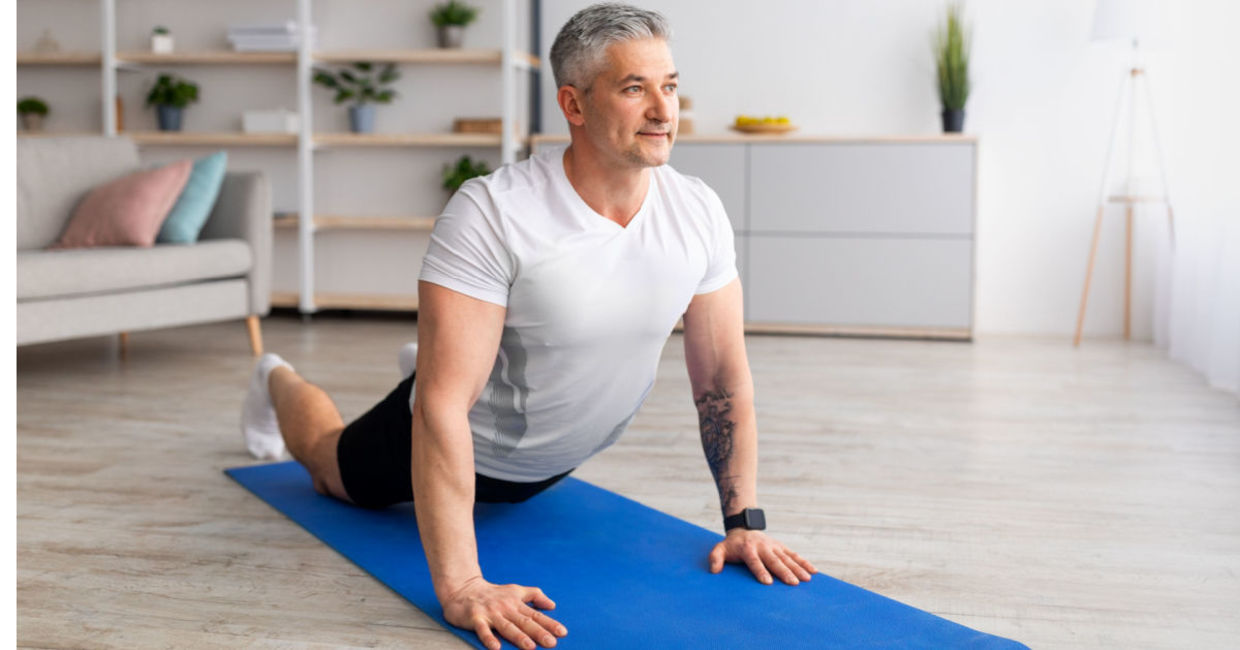 The upward d=facing dog yoga pose.