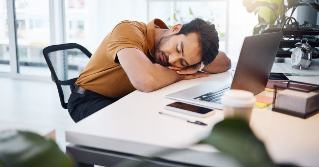 Taking a nap at work.