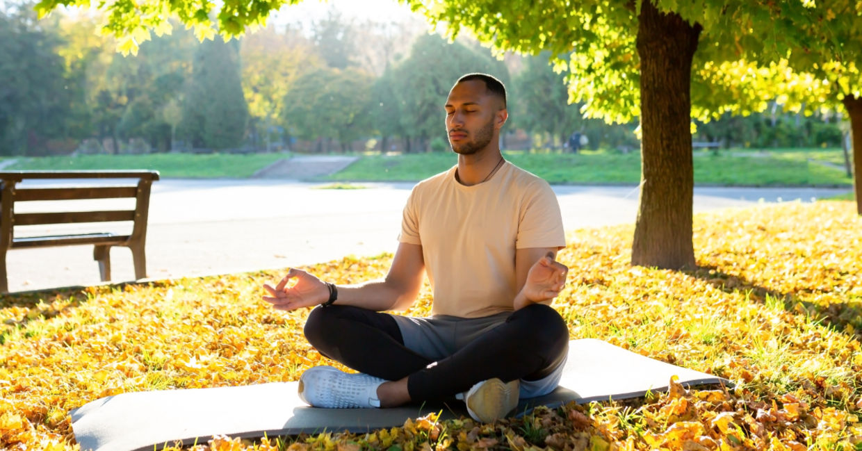 Man in the lotus yoga pose.