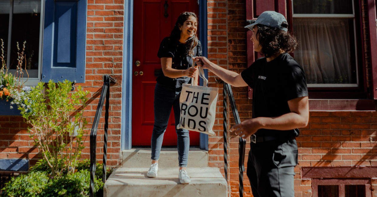 Groceries are delivered in reusable canvas bags.
