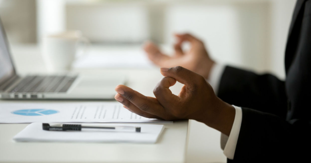 Meditating before work.