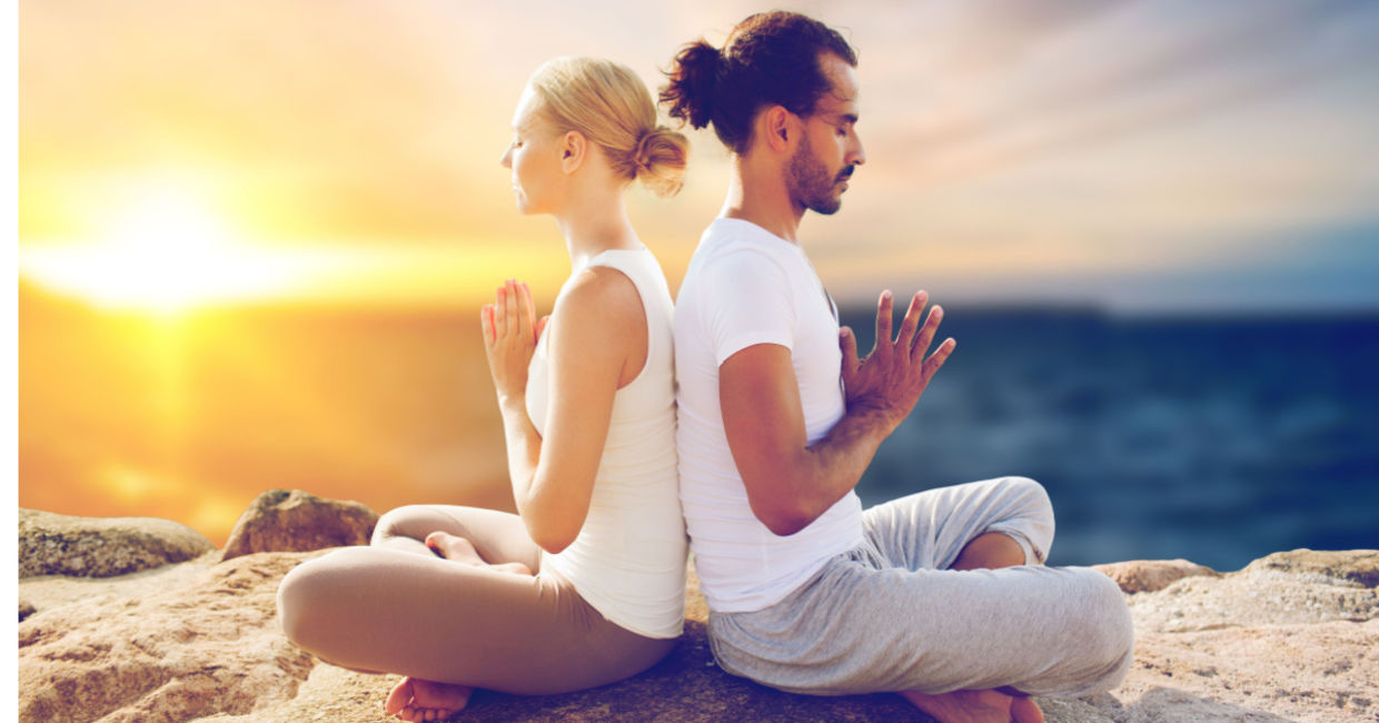 Couple meditating.
