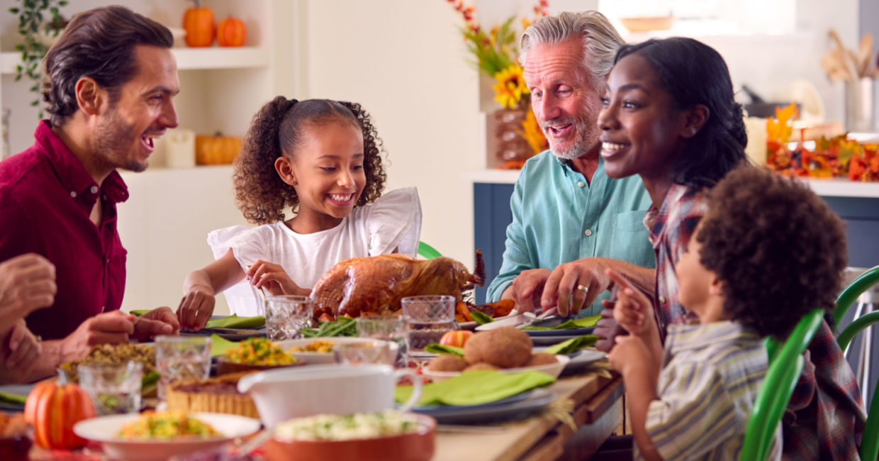Family sharing a Thanksgiving meal.