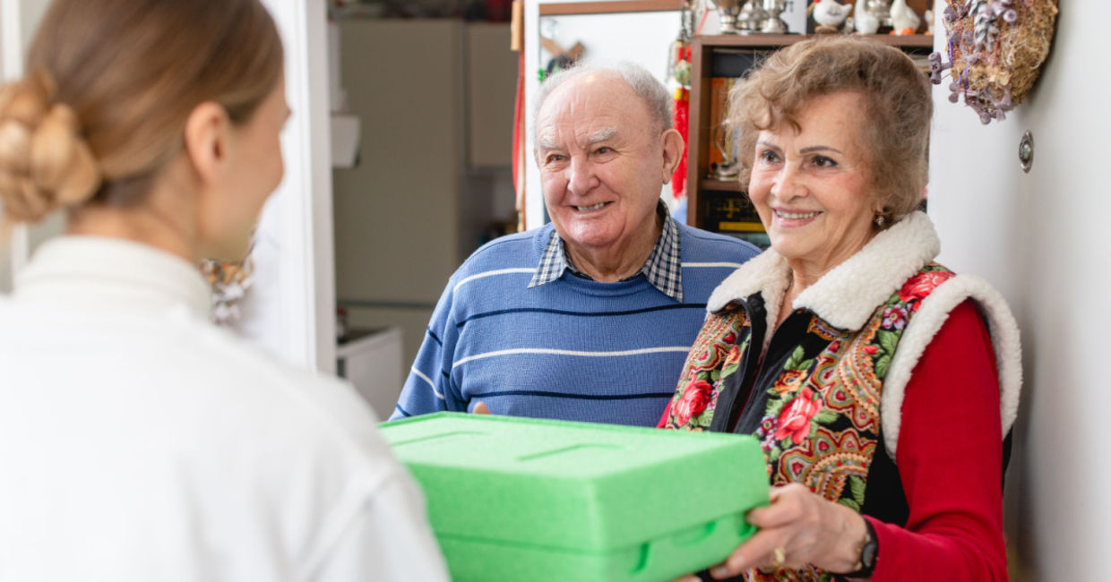 Delivering a meals on wheels Thanksgiving dinner.