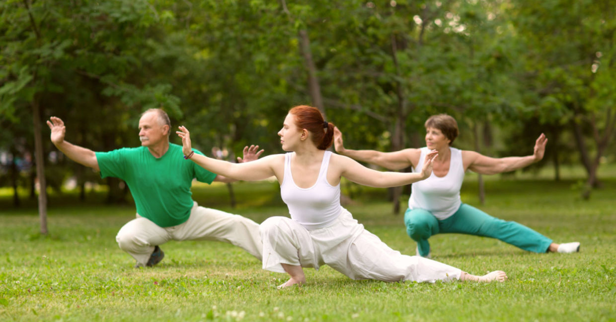 Practicing qigong in a park.