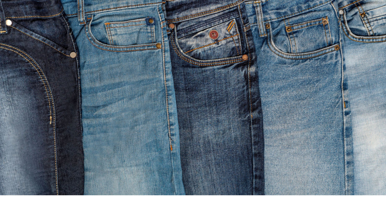 Multiple pairs of blue jeans.