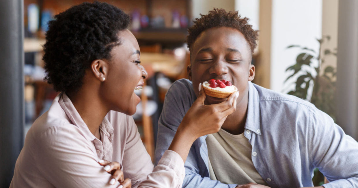 Sharing a romantic dessert on Valentine's Day.